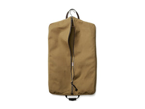 Unzipped Filson Suit Cover bag in tan