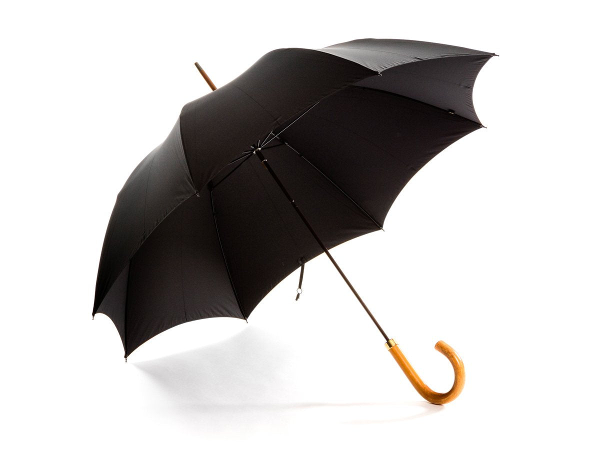 Opened malacca handle foldable tube Fox Umbrella with black canopy