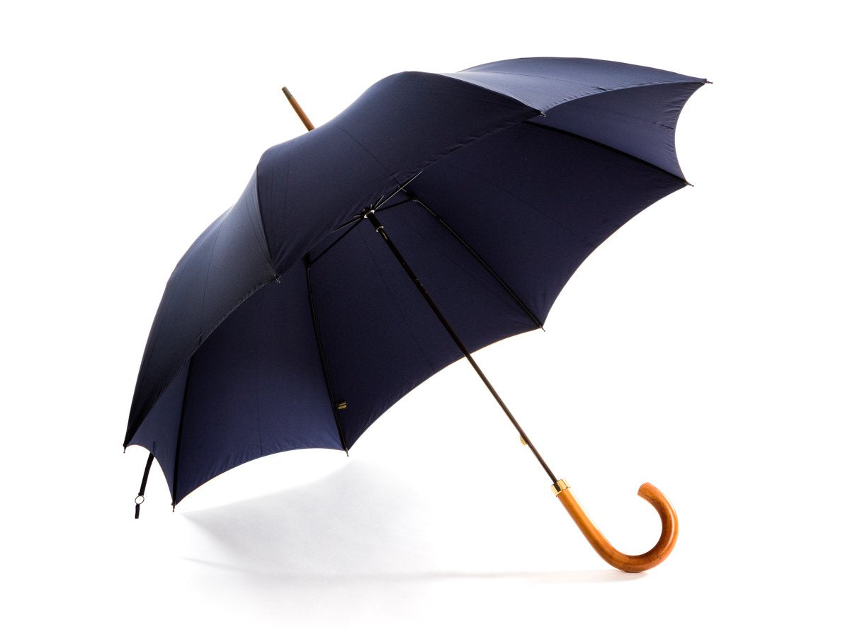 Opened malacca handle foldable tube Fox Umbrella with french navy canopy