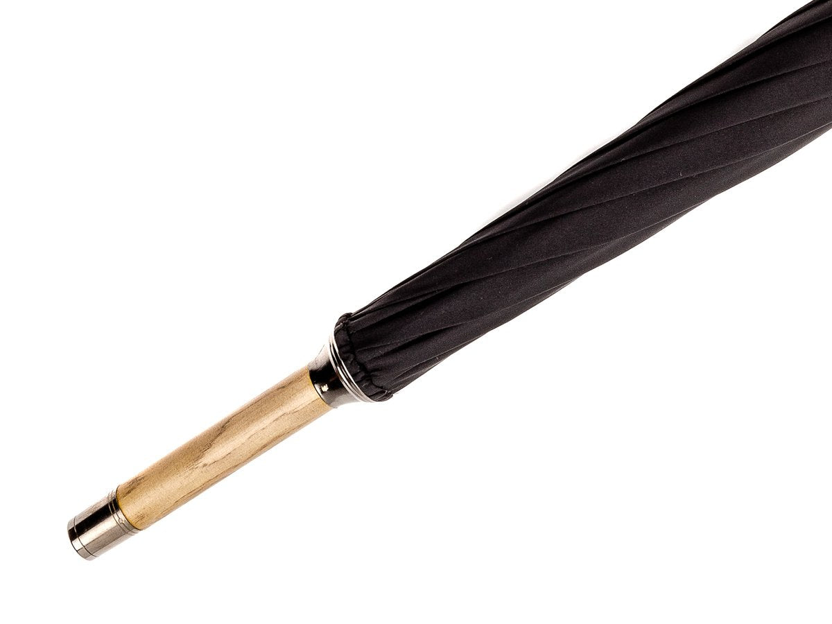 Tip end of solid ash Fox Umbrella with black canopy