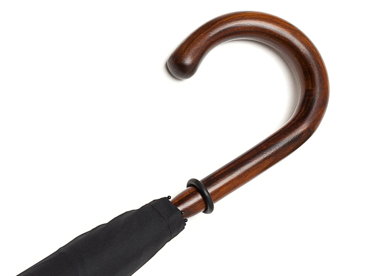 Handle of solid polished cherrywood Fox Umbrella with black canopy