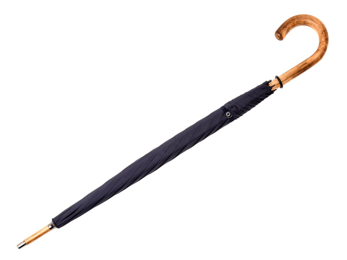 Full length view of solid scorched maple Fox Umbrella with navy canopy