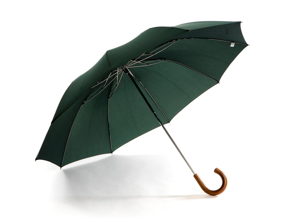 Opened malacca handle telescopic Fox Umbrella with dark green canopy