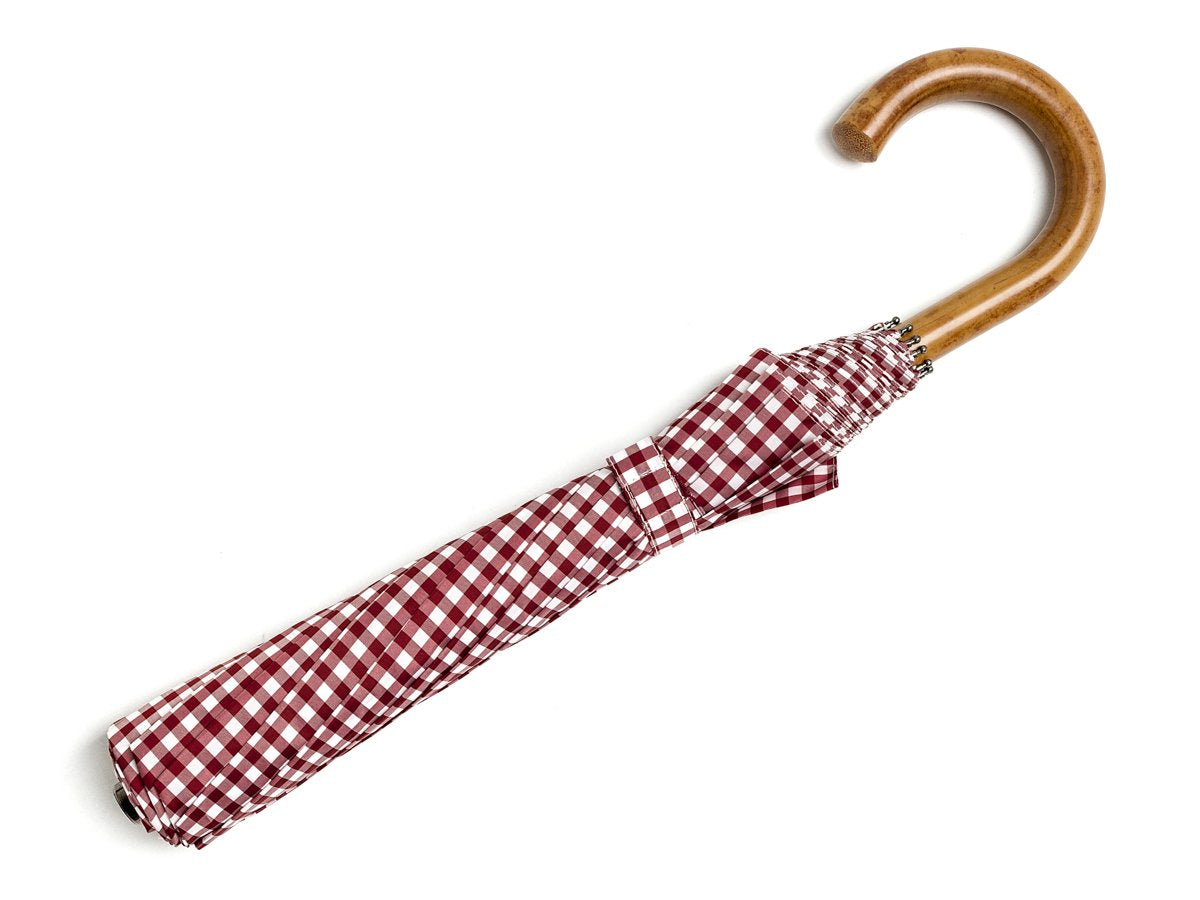 Full length view of malacca handle telescopic Fox Umbrella with wine and white gingham canopy