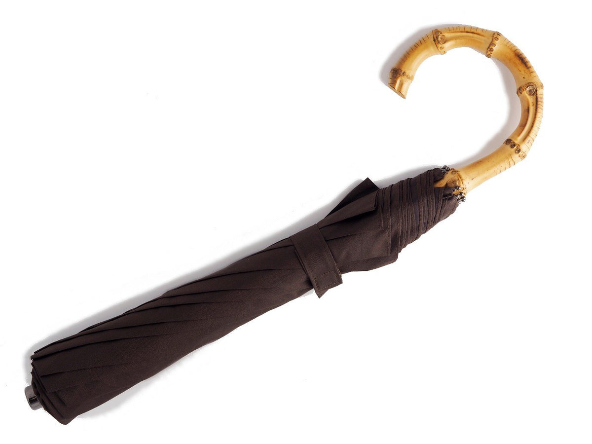 Full length view of whangee handle telescopic Fox Umbrella with brown canopy