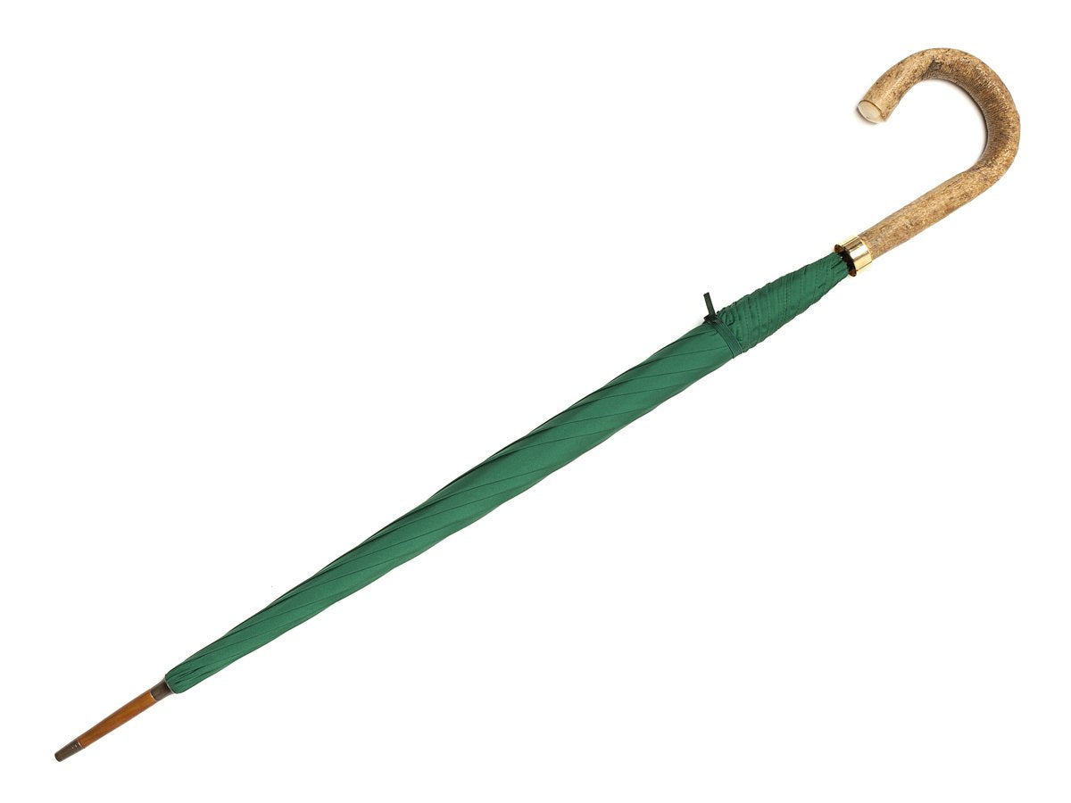 Full length view of ash handle tube Fox Umbrella with emerald canopy