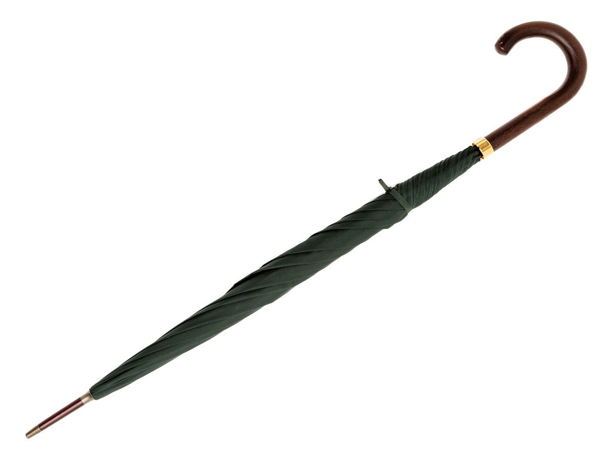 Full length view of dark brown wood handle tube Fox Umbrella with dark green canopy