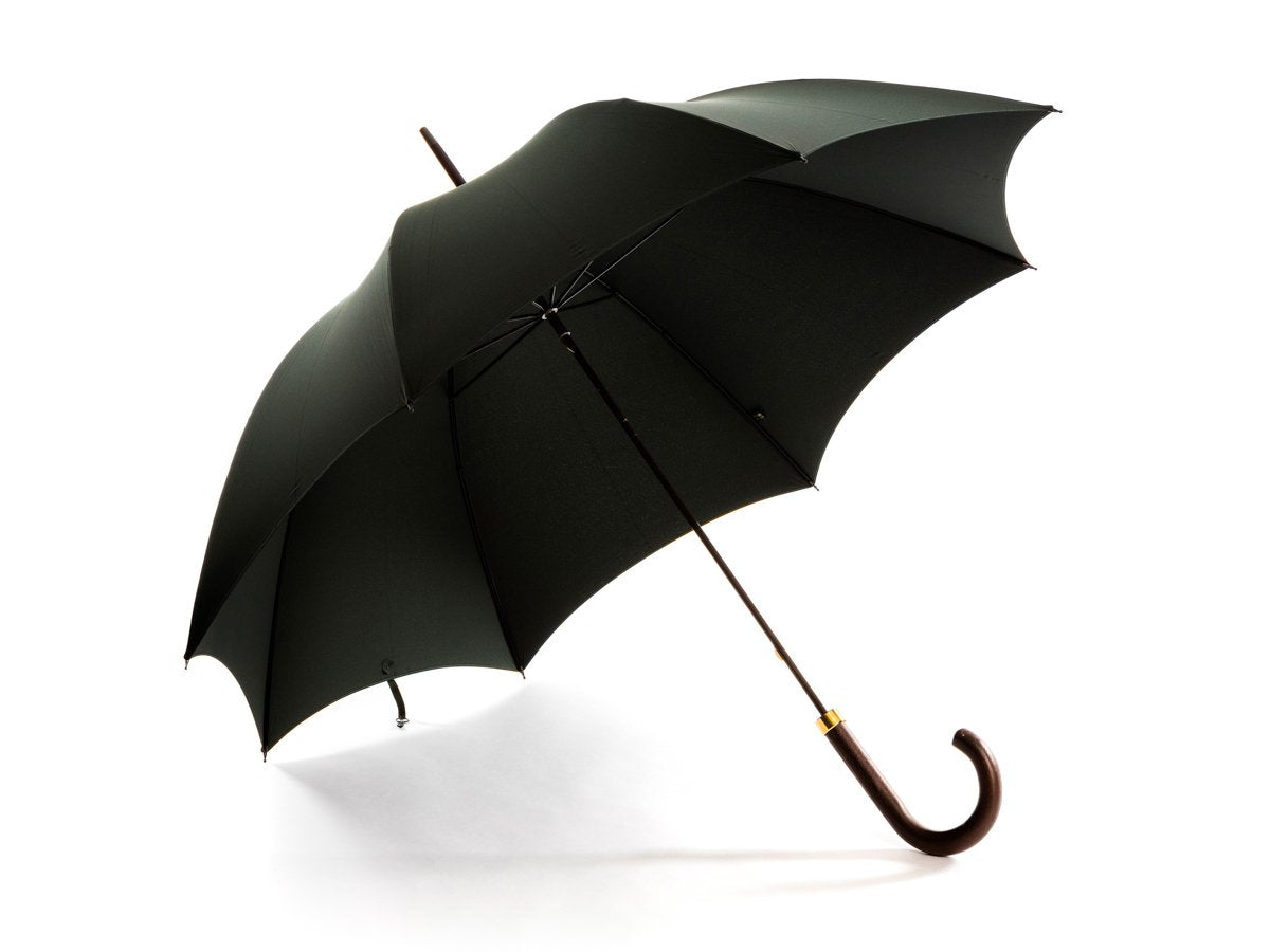 Opened dark brown wood handle tube Fox Umbrella with dark green canopy