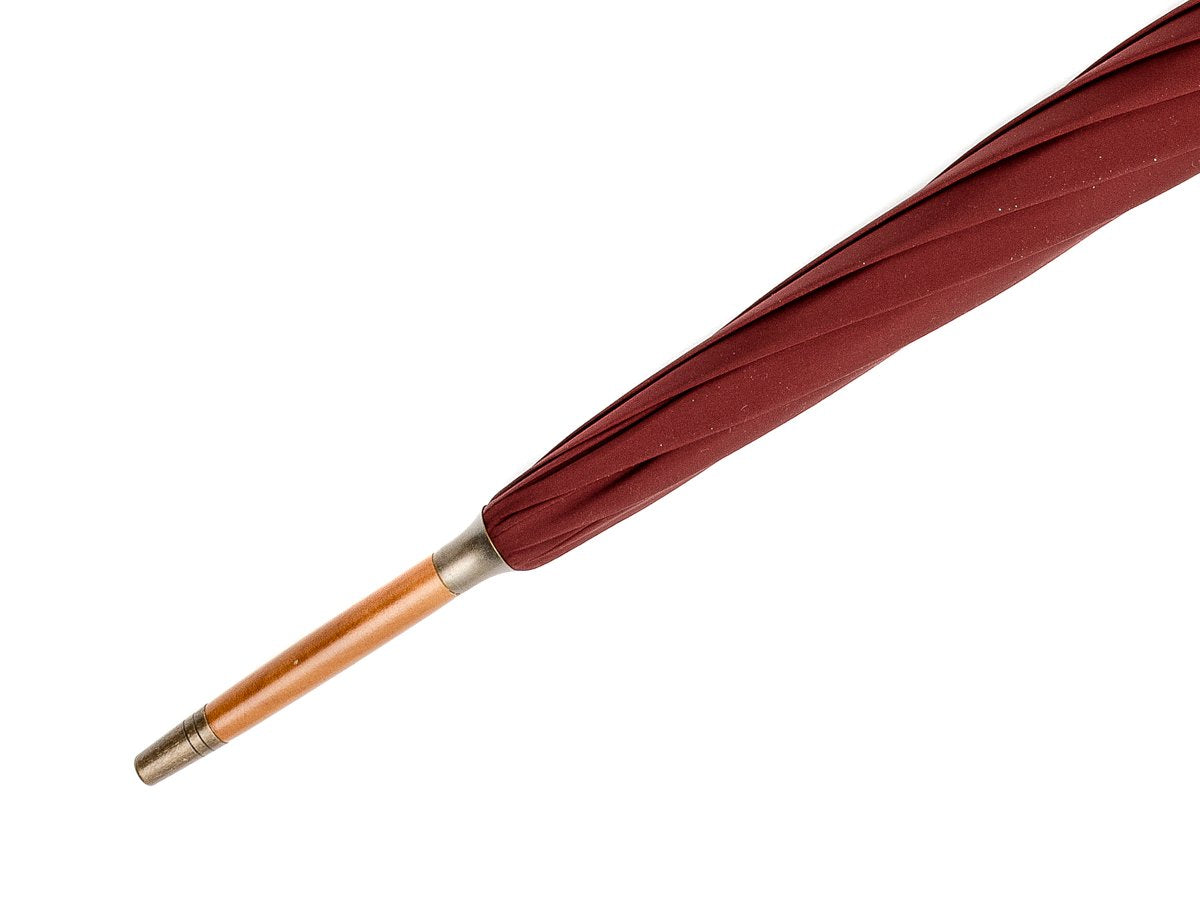 Tip end of whangee handle tube Fox Umbrella with burgundy canopy