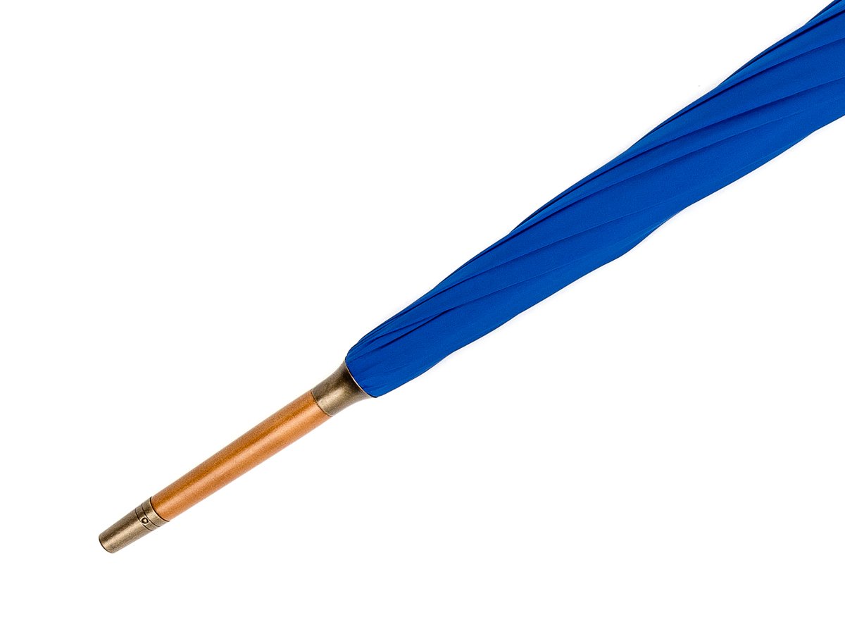 Tip end of whangee handle tube Fox Umbrella with royal blue canopy