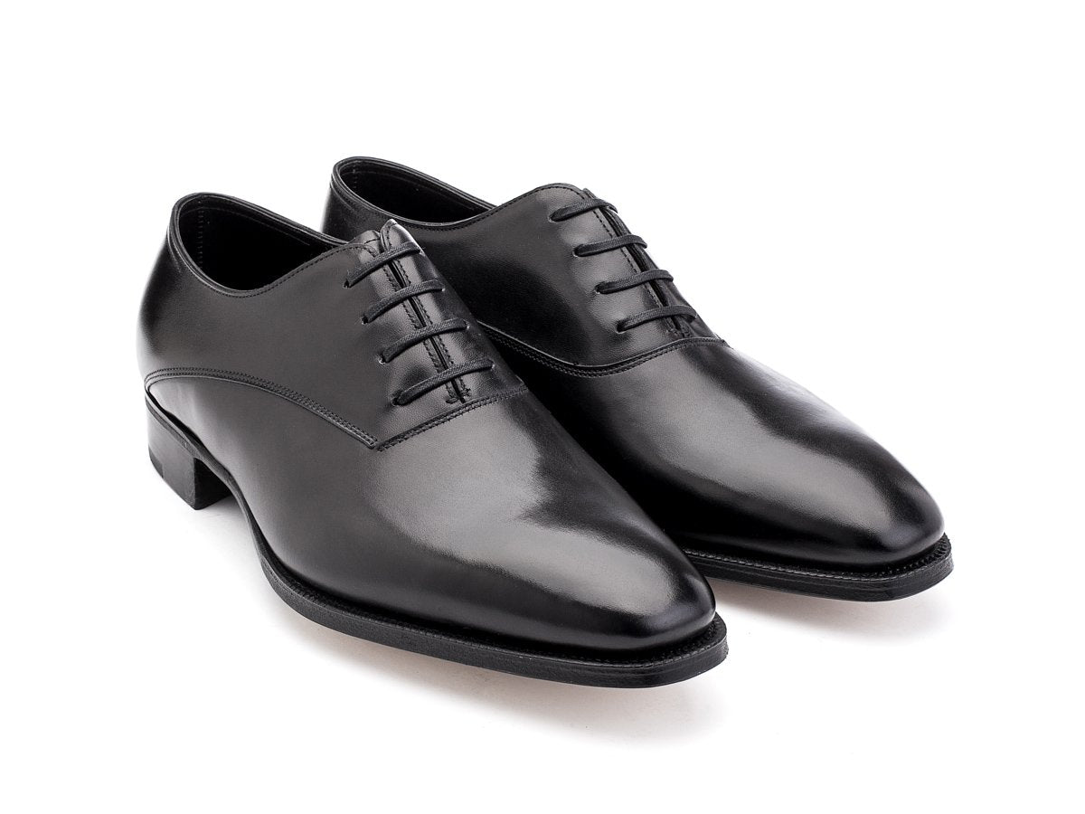 Front angle view of EE width John Lobb Beckett plain toe oxford shoes in black calf