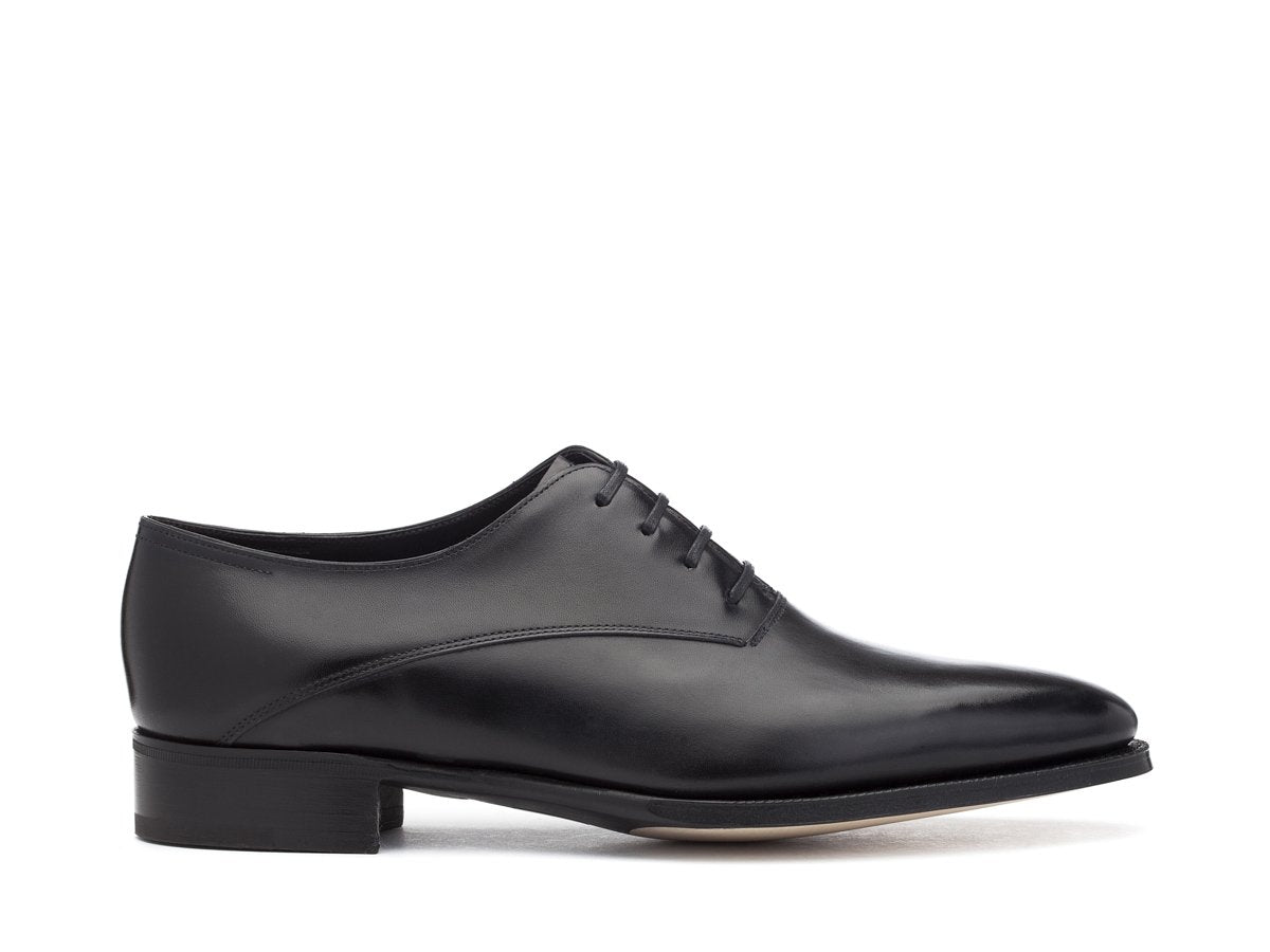 Side view of EE width John Lobb Beckett plain toe oxford shoes in black calf
