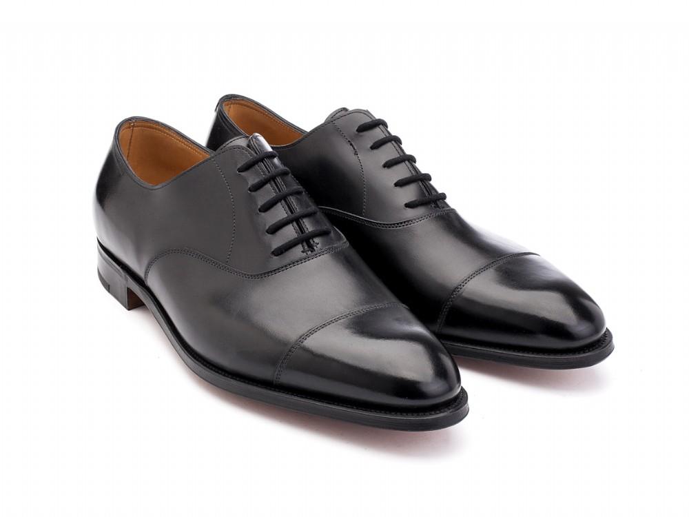 Front angle view of EE width John Lobb City II plain captoe oxford shoes in black calf