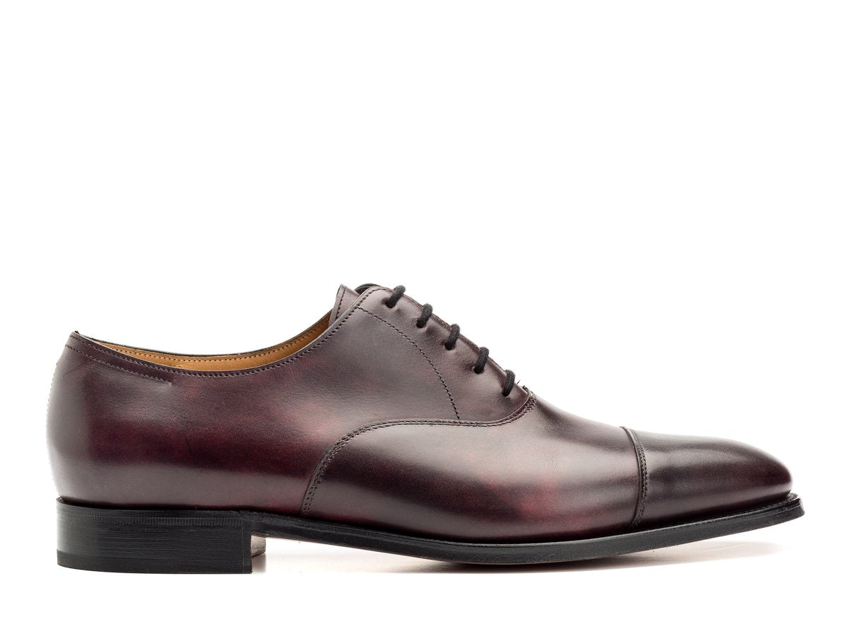 Side view of John Lobb City II plain captoe oxford shoes in plum museum calf