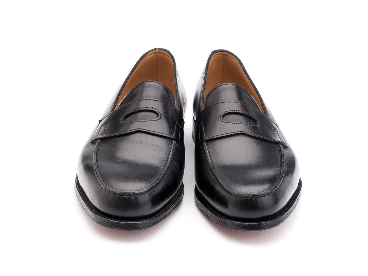 Front view of EE width John Lobb Lopez penny loafers in black calf