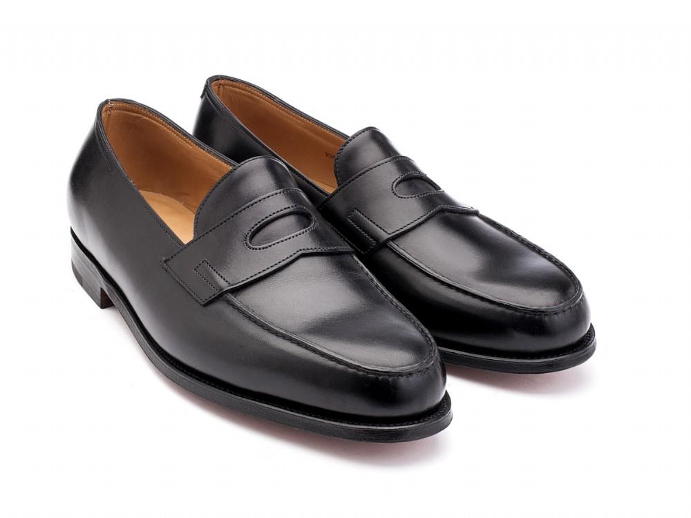 Front angle view of John Lobb Lopez penny loafers in black calf
