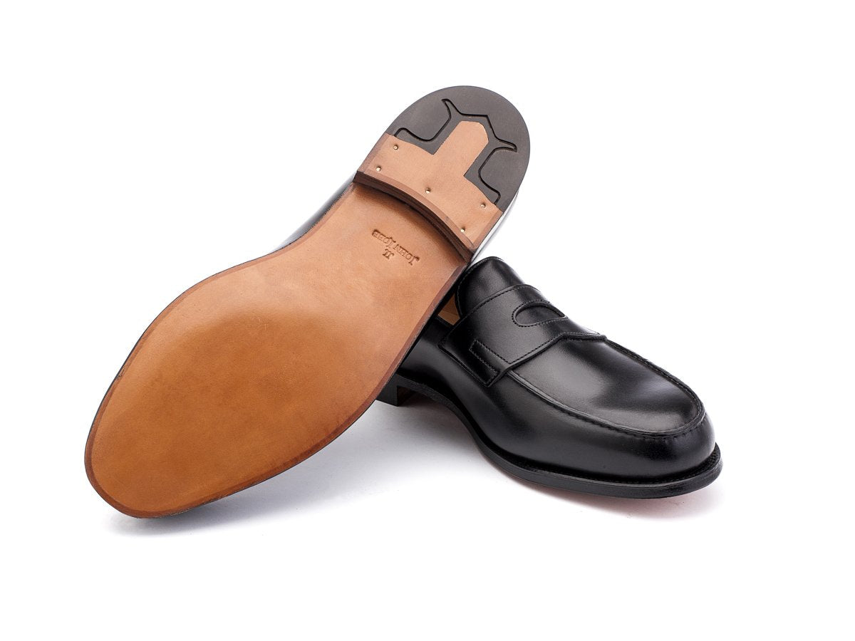 Classic leather sole of John Lobb Lopez penny loafers in black calf