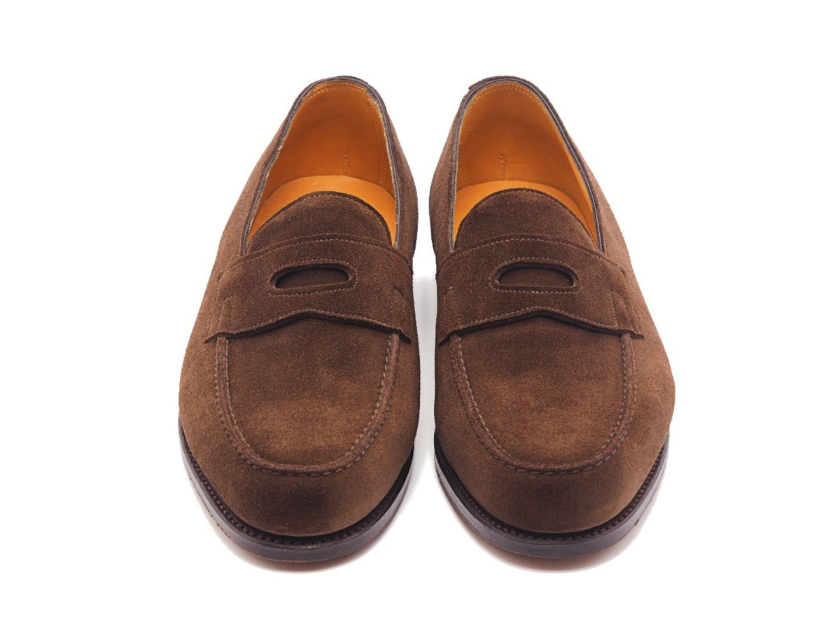 Front view of John Lobb Lopez penny loafers in dark brown suede
