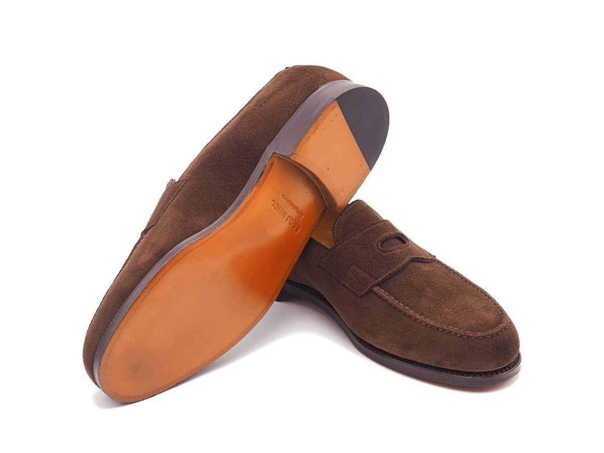 Classic leather sole of John Lobb Lopez penny loafers in dark brown suede