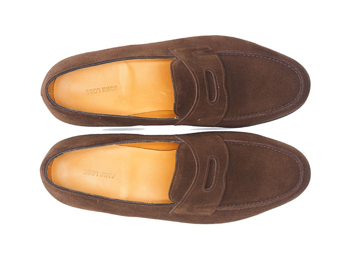 Top view of John Lobb Lopez penny loafers in dark brown suede