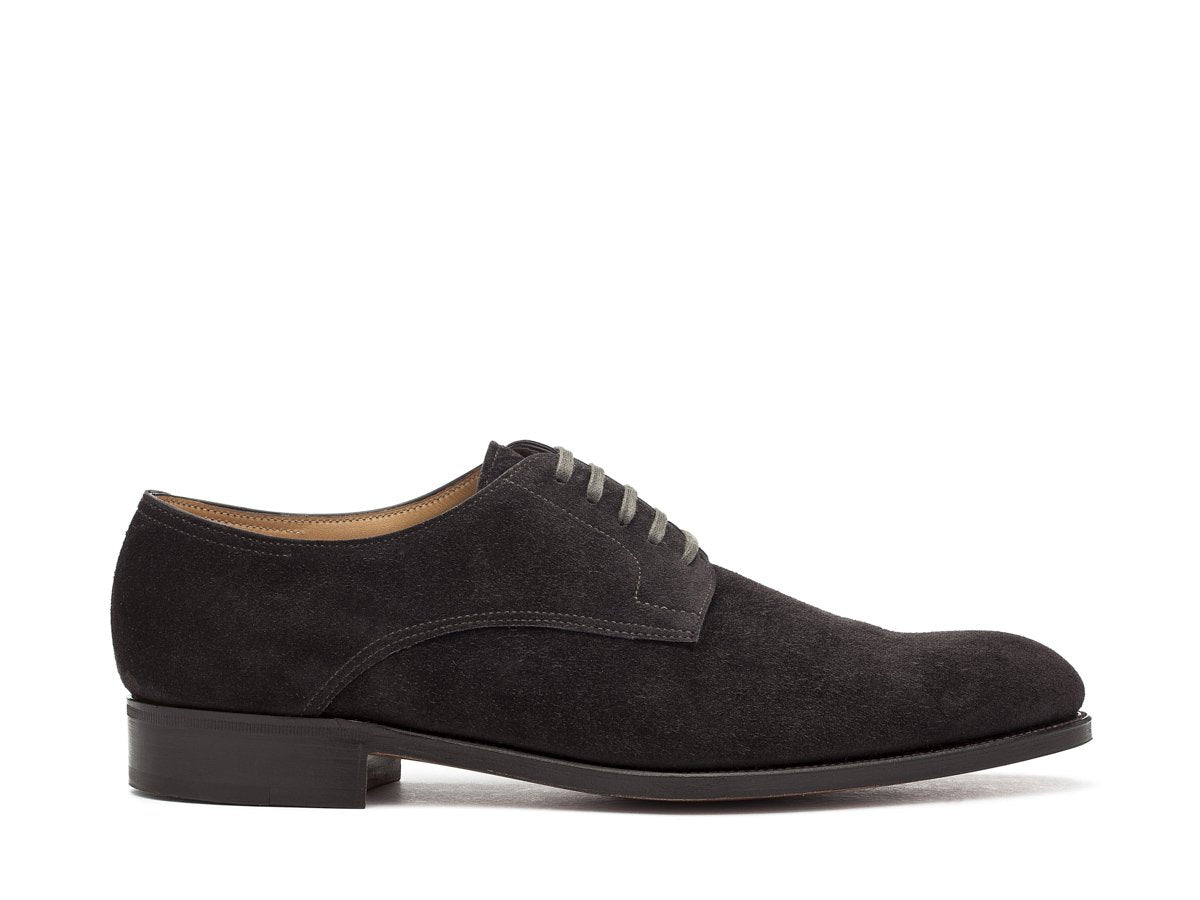 Side view of EE width John Lobb Penzance plain toe derby shoes in dark grey suede