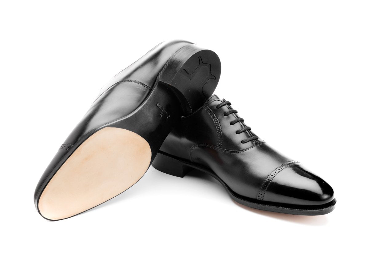 Prestige leather sole of John Lobb Philip II quarter brogue oxford shoes in black oxford calf
