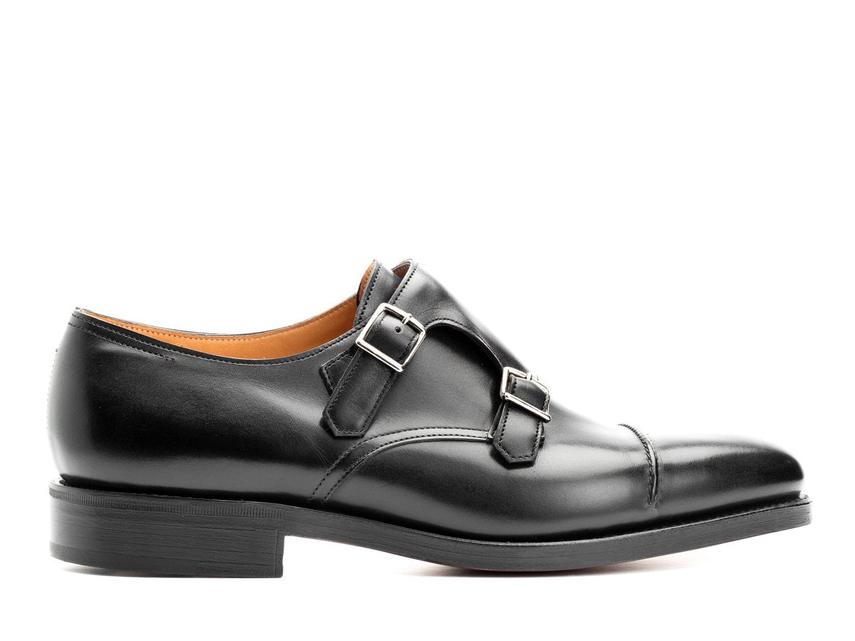 Side view of EE width John Lobb William II captoe double monk strap shoes in black calf